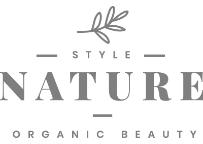 Schlaegle Design Build Associates, Inc. logo featuring the word "NATURE" in bold letters with a leaf motif, representing their focus on organic beauty and architectural design.