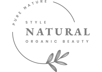 Logo of Schlaegle Design Build Associates, Inc., featuring the text "NATURAL" prominently, surrounded by phrases "PURE NATURE," "STYLE," and "ORGANIC BEAUTY," with a decorative leaf design.