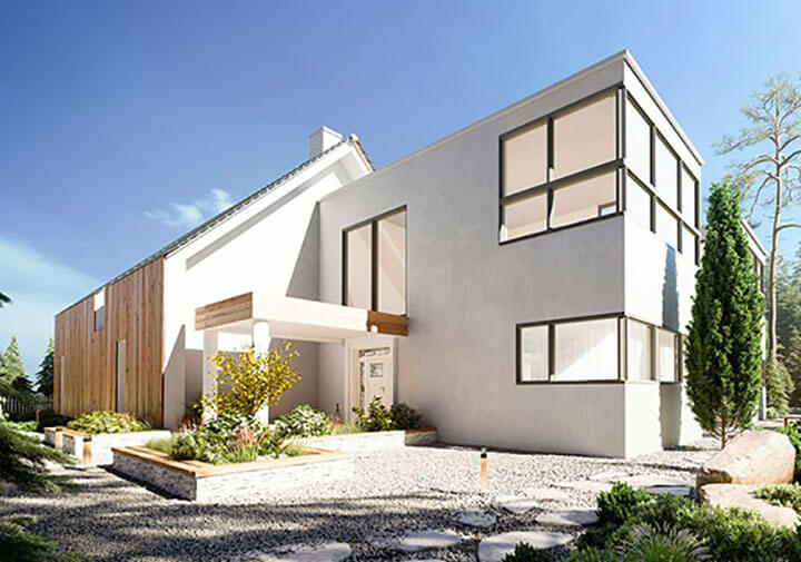 Modern educational building design with large windows, natural landscaping, and a welcoming entrance, showcasing Schlaegle Design Build Associates' architectural style.